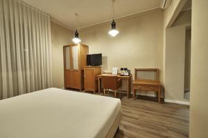 TV a/nebo společenská místnost v ubytování Hotel Miramonti