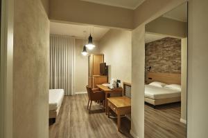 Postel nebo postele na pokoji v ubytování Hotel Miramonti