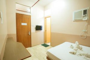 TV a/nebo společenská místnost v ubytování GV Hotel - Tagbilaran City