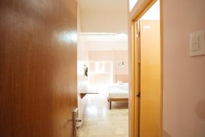Postel nebo postele na pokoji v ubytování GV Hotel - Tagbilaran City