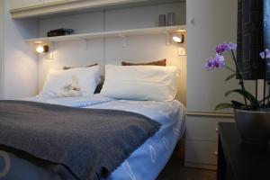 Postel nebo postele na pokoji v ubytování 3MÙZEN apartments