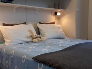 Postel nebo postele na pokoji v ubytování 3MÙZEN apartments