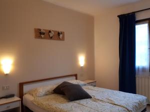Postel nebo postele na pokoji v ubytování 3MÙZEN apartments