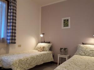 Postel nebo postele na pokoji v ubytování 3MÙZEN apartments