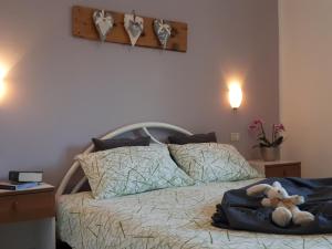 Postel nebo postele na pokoji v ubytování 3MÙZEN apartments