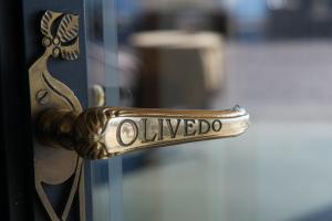 Сертификат, награда, вывеска или другой документ, выставленный в Hotel Olivedo