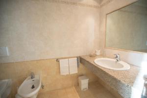 Ванная комната в Hotel Olivedo