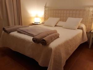 Postel nebo postele na pokoji v ubytování Rincon Canela