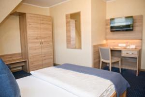 Postel nebo postele na pokoji v ubytování Hotel Pieper-Kersten