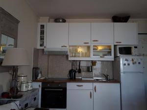 Cosy Home tesisinde mutfak veya mini mutfak