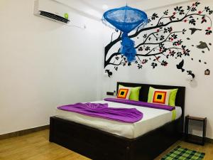 Postel nebo postele na pokoji v ubytování Lavendra Paradise