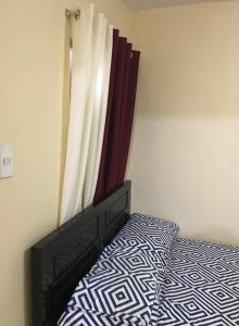 A bed or beds in a room at RV3 TRANSIENT HOUSE