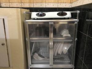 A kitchen or kitchenette at RV3 TRANSIENT HOUSE