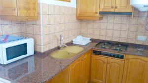 Kuchyňa alebo kuchynka v ubytovaní Apartments Benimeit
