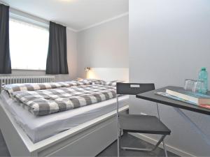 Krevet ili kreveti u jedinici u okviru objekta Spacious Holiday Home in L wensen Lower Saxony near Forest