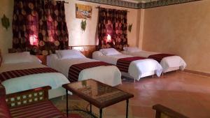 Hotel Kasbah Lamrani客房内的一张或多张床位