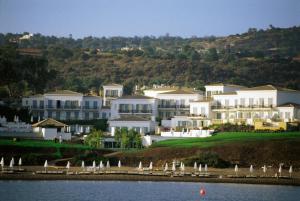 a view of a resort from the water at Anassa in Polis Chrysochous