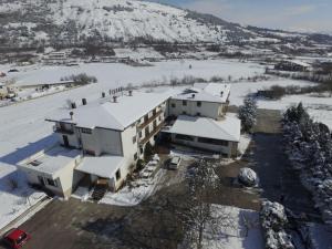 an aerial view of a house in the snow at Hotel Paradiso in Celano