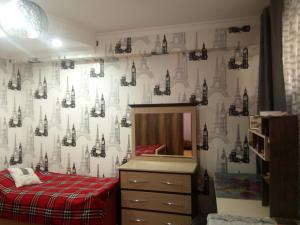 Кровать или кровати в номере Baku Central Apartment