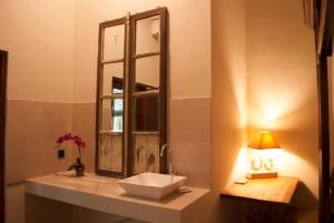 Ванная комната в Casa Narrow Villa