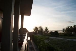 a view of the ocean from a house at Casa Narrow Villa in Nembrala