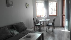 Posedenie v ubytovaní Apartamenty "MILENA"