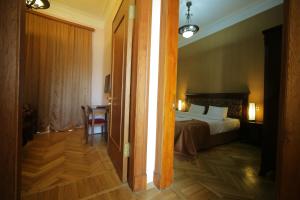 Voodi või voodid majutusasutuse Legends Tskaltubo Spa Resort toas