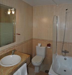 Koupelna v ubytování Hotel Albero