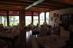 A restaurant or other place to eat at Agriturismo Le Campagnole