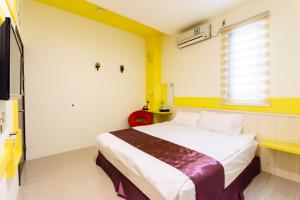 Krevet ili kreveti u jedinici u okviru objekta Tiramisu places Sea view Homestay