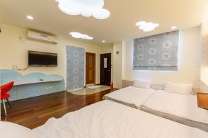 Krevet ili kreveti u jedinici u okviru objekta Tiramisu places Sea view Homestay