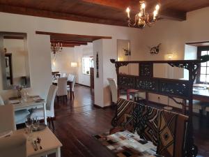 A restaurant or other place to eat at De Kloof Heritage Estate Hotel and Wellness