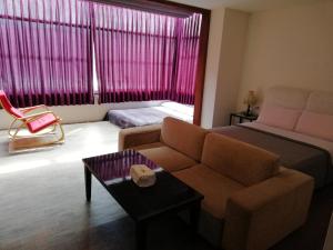 Posezení v ubytování Tata House B&B