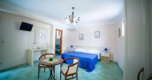 Postel nebo postele na pokoji v ubytování Casa Vacanze Vittoria