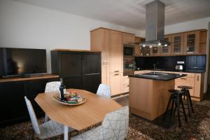 Kuchyň nebo kuchyňský kout v ubytování Bed&Bike Prachatice