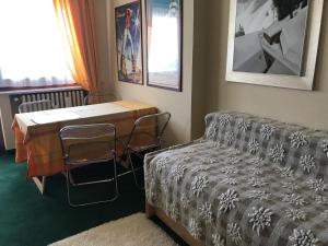 Cama ou camas em um quarto em Appartamento A Sestrieres non valida