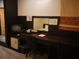 A television and/or entertainment centre at Kong Garden View Resort Chiang Rai