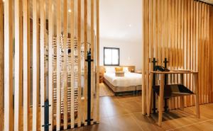 Postel nebo postele na pokoji v ubytování Citta di Lume Suites & Lofts + 37 fotografií