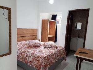 Postel nebo postele na pokoji v ubytování Pousada Maria Helena