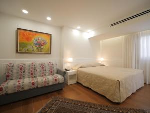 Cama o camas de una habitación en Margoa Hotel Netanya