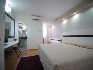 Cama o camas de una habitación en Margoa Hotel Netanya