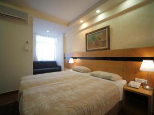Cama o camas de una habitación en Margoa Hotel Netanya