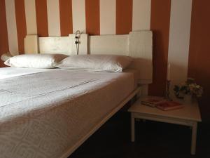 Ein Bett oder Betten in einem Zimmer der Unterkunft Casa Vacanza Castagna