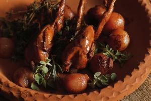 a bowl of food with meat and vegetables in it at Anassa in Polis Chrysochous