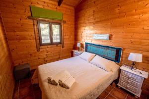 Łóżko lub łóżka w pokoju w obiekcie Rural Tarifa Beach Las Cabañas