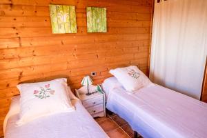 Łóżko lub łóżka w pokoju w obiekcie Rural Tarifa Beach Las Cabañas