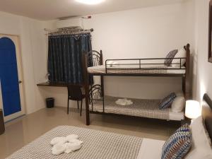 Katil atau katil-katil dalam bilik di D´Gecko Hotel