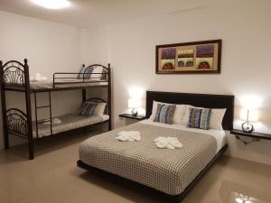 Katil atau katil-katil dalam bilik di D´Gecko Hotel