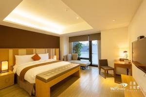 Voodi või voodid majutusasutuse ISPAVITA B&B Resort toas
