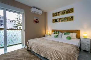 A bed or beds in a room at weforyou near the beach TWO bedrooms in Pueblo Evita